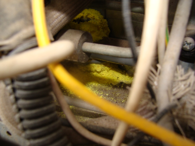 If you see this kind of yellow powder inside the refrigerator compartment, shut down immediately. You're most likely going to need a new cooling unit.