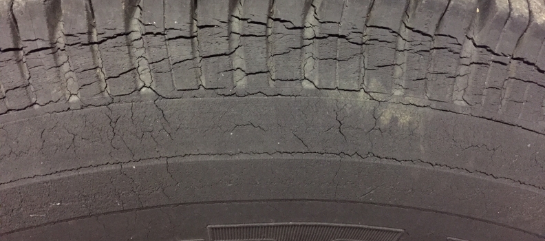 Dry rot on the tires will look cracked and sometimes have a greenish weathered look.
