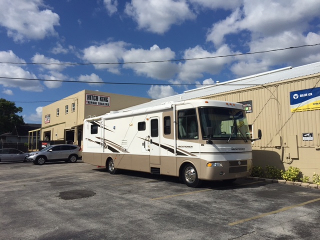 The RV sitting at Hitch King getting the hitch installed.