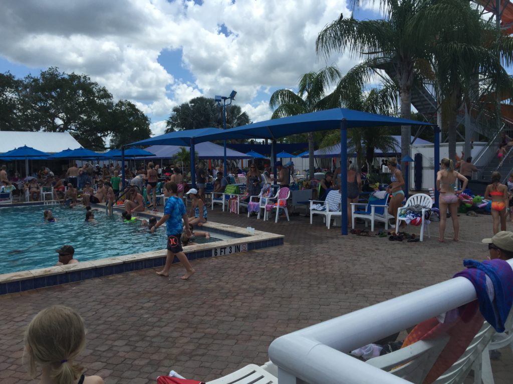 The entire pool area looked this crowded. At one point, I joked that I could possibly have walked across the pool without getting wet... just by stepping on people's heads. ;)